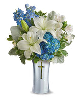 Cross vase with white roses and blue hydrangea
