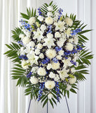 Blue delphinium and white flower standing spray