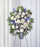 Blue delphinium and white flower standing spray